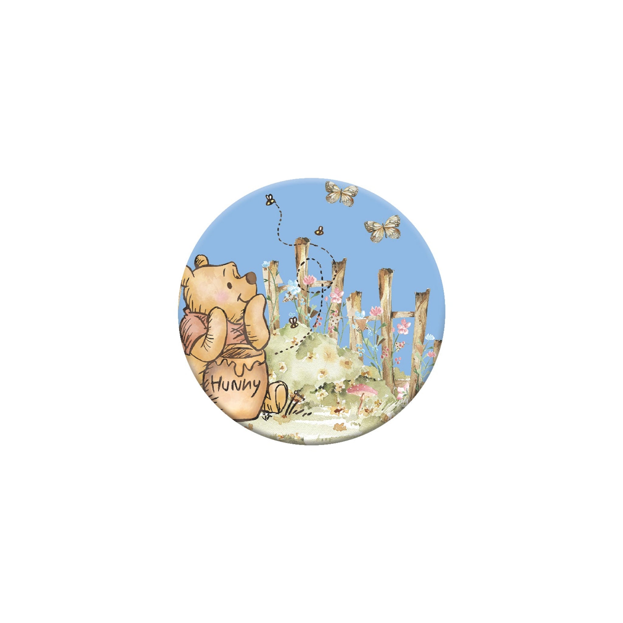 Circular sticker with a cartoon bear and flowers on a white background
