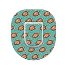 Phone ring holder with turtle pattern on a turquoise background