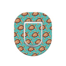 Phone ring holder with turtle pattern on a turquoise background