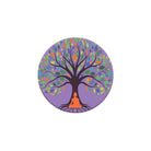 Circular logo with a tree of life and a person in meditation on a white background