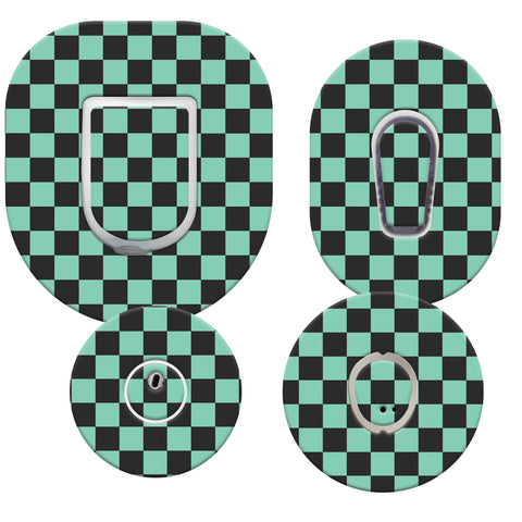 Four checkered adhesive pads with hooks on a white background