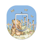 Phone ring holder with cartoon bear design on a blue background