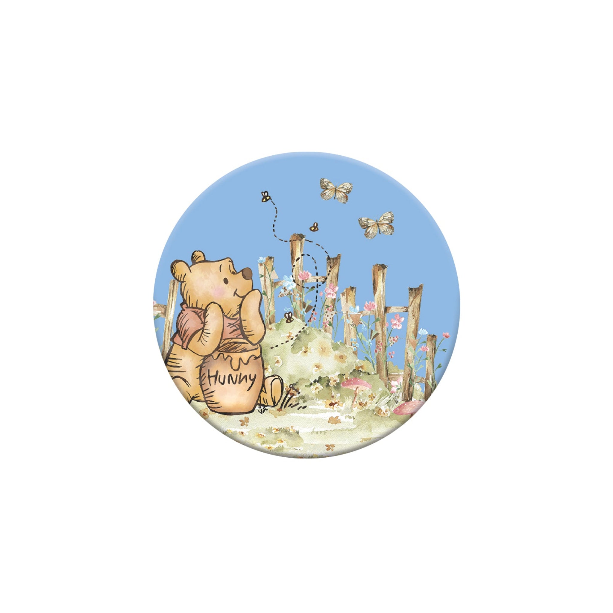 Circular sticker with a cartoon bear holding a honey pot and flowers on a white background